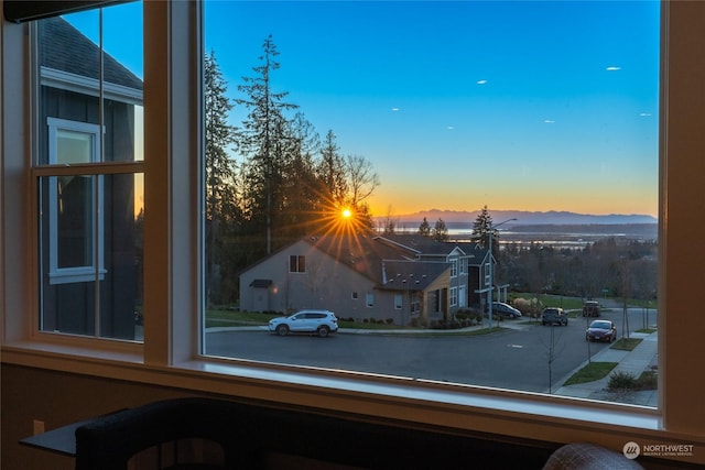 property's view of city with a mountain view