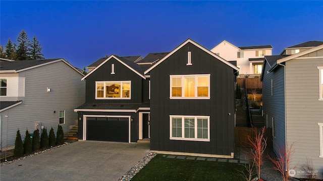 view of front of property featuring a garage