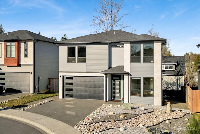 view of front of property featuring a garage