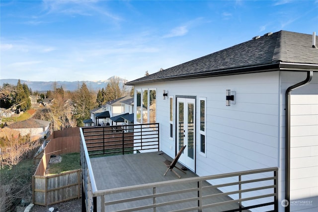 view of side of home with a mountain view