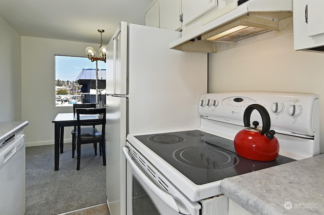 kitchen featuring decorative light fixtures, white cabinets, dark colored carpet, white appliances, and an inviting chandelier