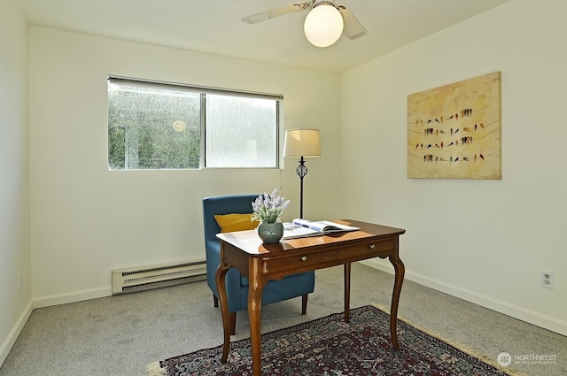 carpeted office space with a baseboard radiator and ceiling fan