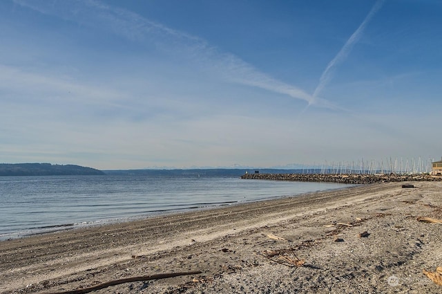 property view of water featuring a beach view