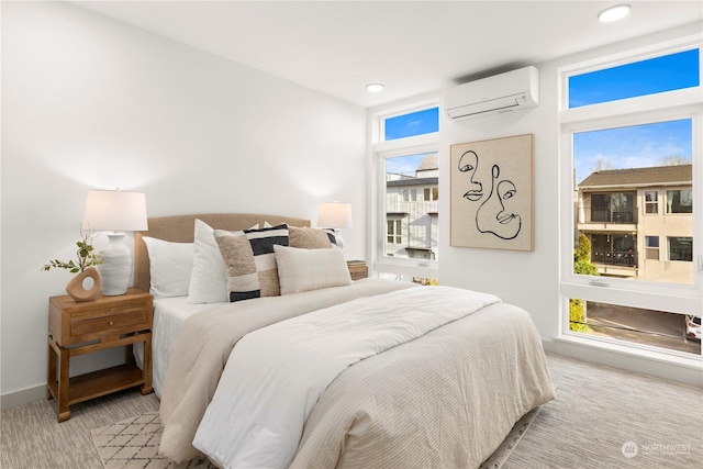 bedroom featuring a wall mounted air conditioner and multiple windows