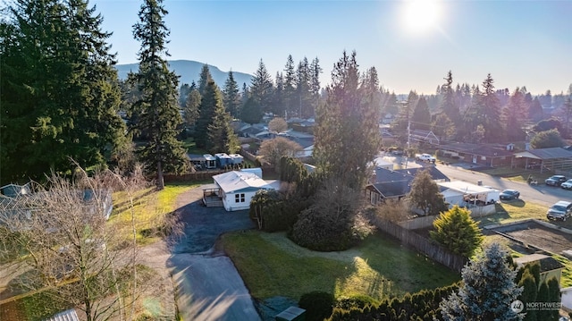 drone / aerial view featuring a mountain view