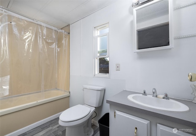 full bathroom with shower / bathtub combination with curtain, vanity, hardwood / wood-style flooring, and toilet