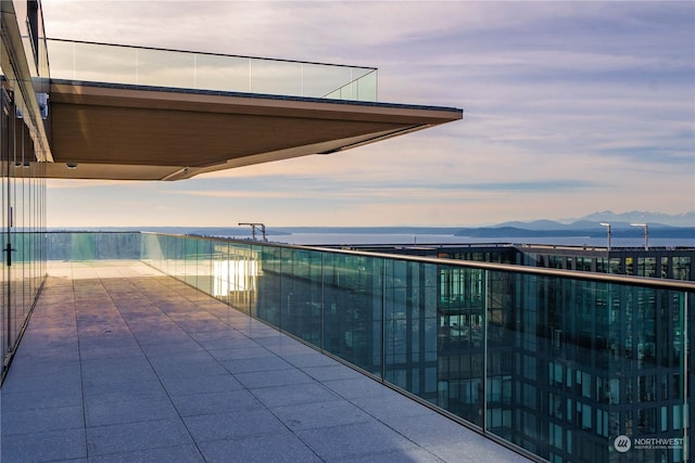 balcony at dusk with a mountain view