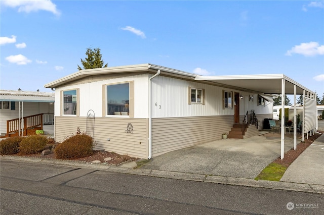 manufactured / mobile home with a carport