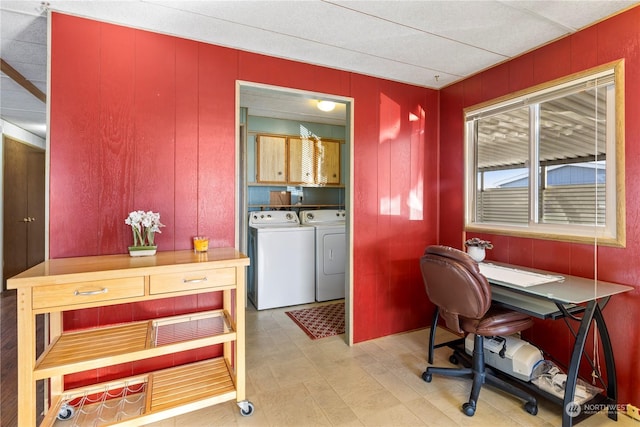 office area featuring washer and dryer