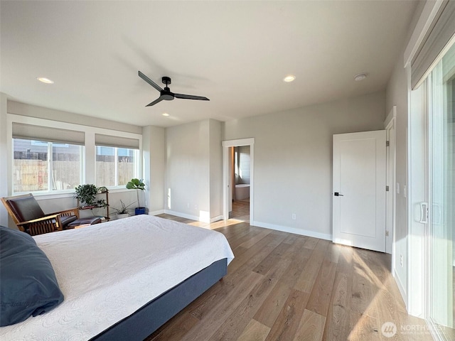 bedroom with light wood-type flooring and ceiling fan