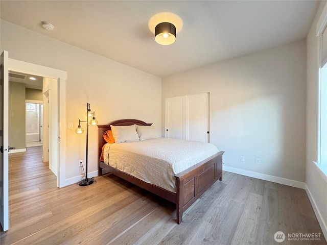 bedroom featuring light hardwood / wood-style flooring