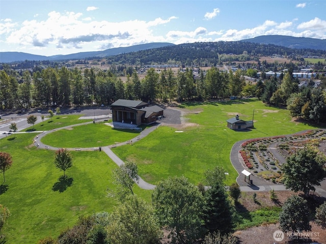 birds eye view of property featuring a mountain view
