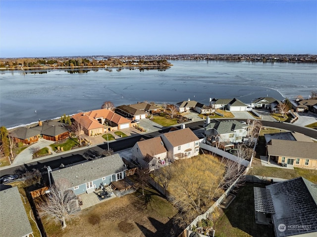 bird's eye view with a water view