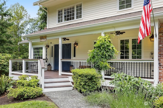 property entrance with a porch and ceiling fan