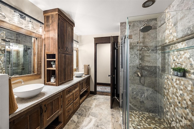 bathroom with vanity and walk in shower