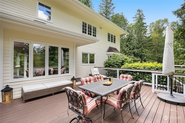 wooden deck with an outdoor hangout area