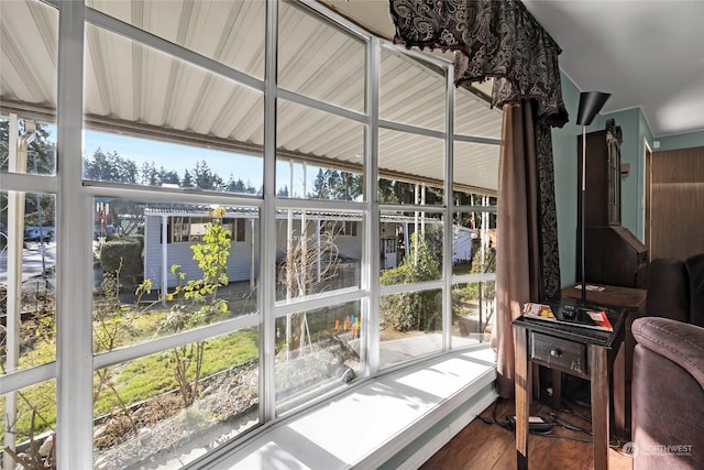 sunroom / solarium with a healthy amount of sunlight