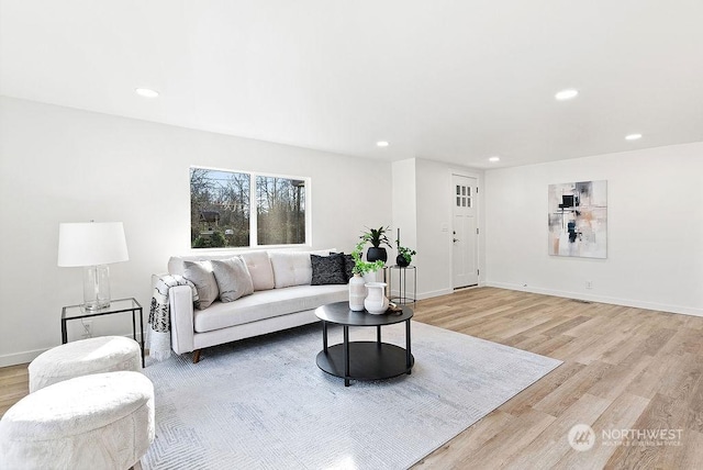 living room with light hardwood / wood-style floors