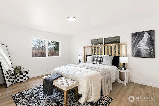 bedroom featuring wood-type flooring