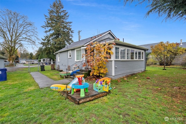 view of front of home with a front lawn