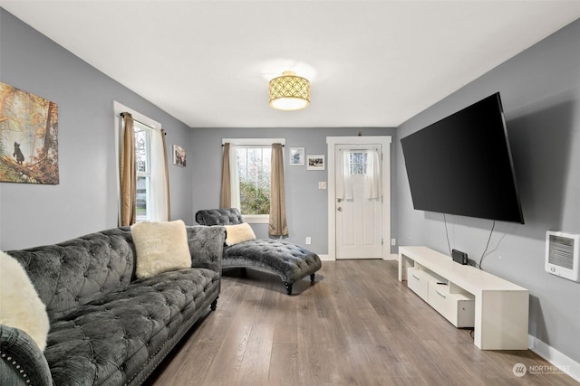 living room with light hardwood / wood-style flooring