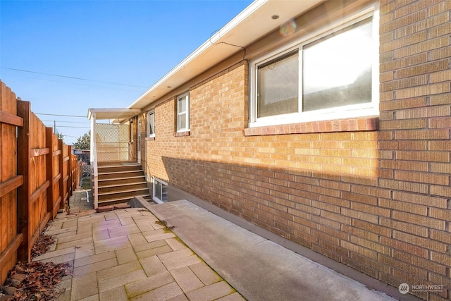 view of home's exterior with a patio area