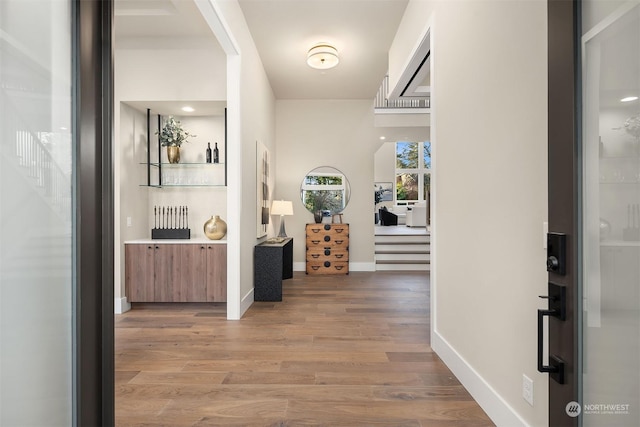 hall featuring hardwood / wood-style floors