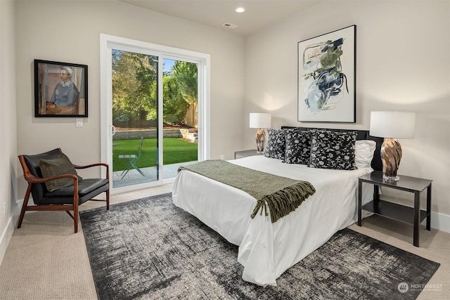 bedroom featuring carpet floors and access to outside