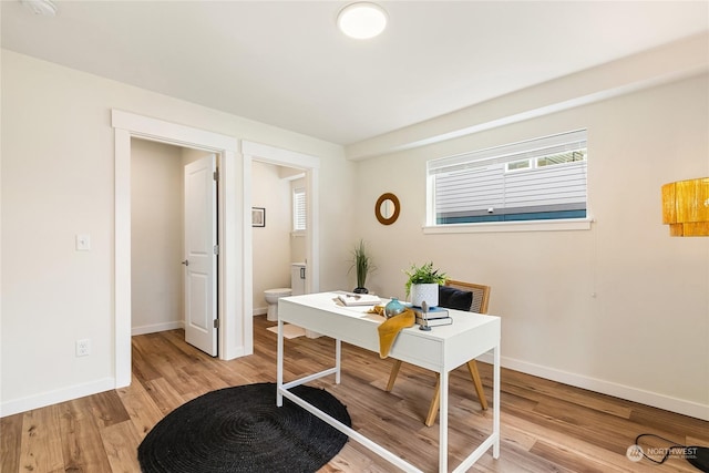 home office featuring light hardwood / wood-style flooring