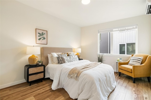 bedroom with light wood-type flooring