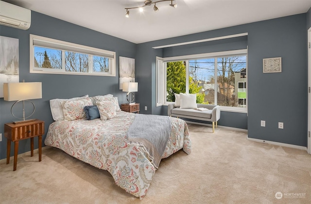 bedroom featuring a wall mounted AC and light colored carpet