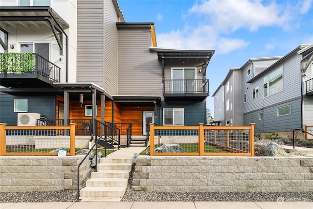 view of front of house with ac unit