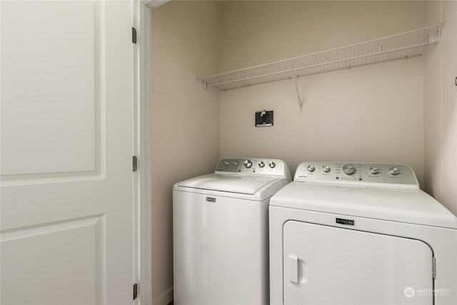 laundry area featuring separate washer and dryer