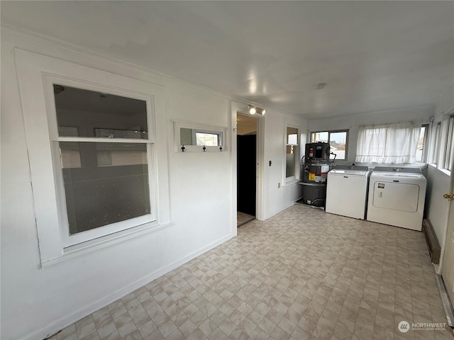 washroom featuring independent washer and dryer