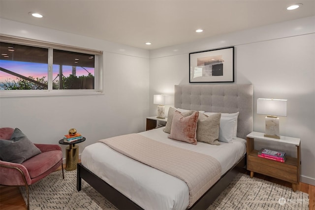 bedroom featuring light hardwood / wood-style flooring