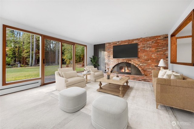 carpeted living room with a brick fireplace and baseboard heating