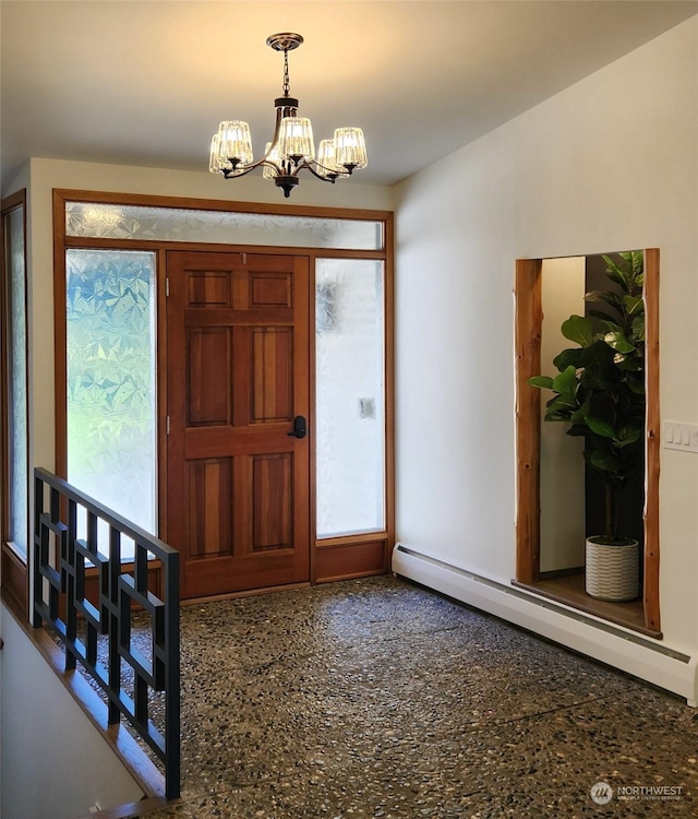 entryway with an inviting chandelier and a baseboard radiator