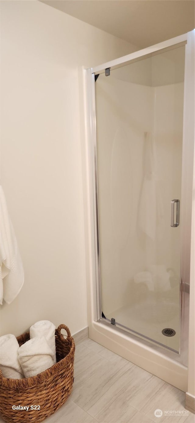 bathroom with an enclosed shower