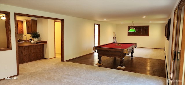 rec room featuring sink, light carpet, and pool table