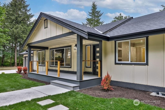 exterior space featuring a yard and a porch