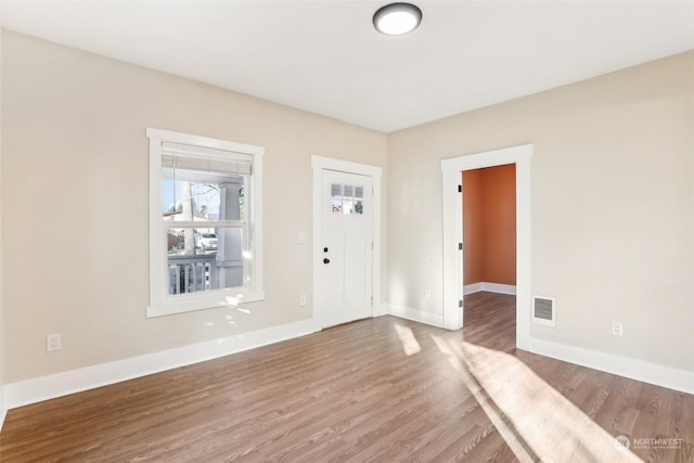 foyer with hardwood / wood-style floors