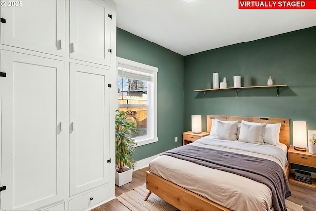 bedroom featuring light hardwood / wood-style flooring