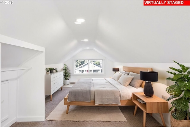 bedroom featuring vaulted ceiling