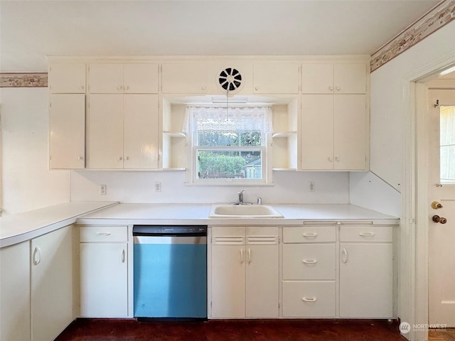 kitchen featuring white cabinetry, sink, and dishwasher