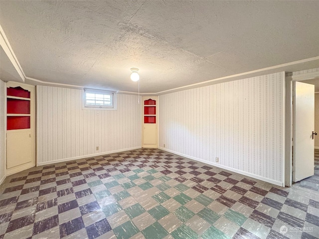 basement with a textured ceiling