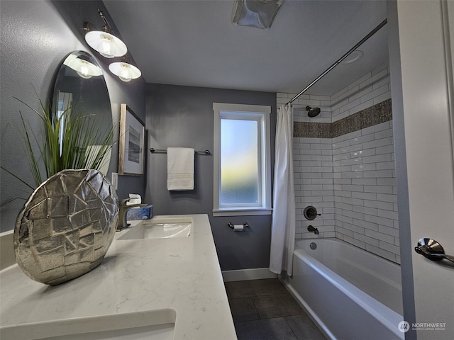 bathroom featuring shower / tub combo with curtain, vanity, and tile patterned flooring