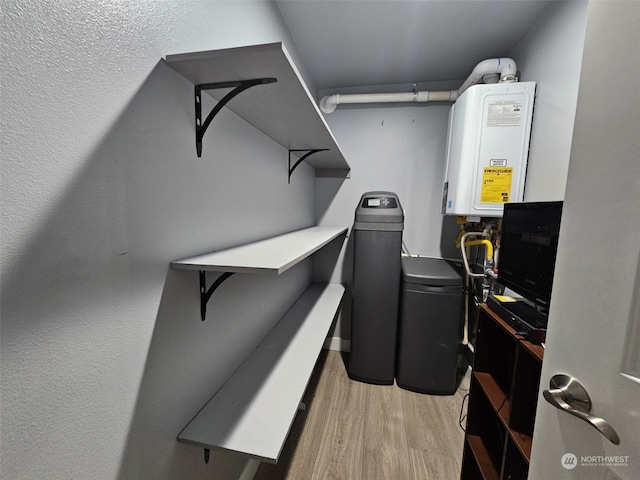 utility room with water heater