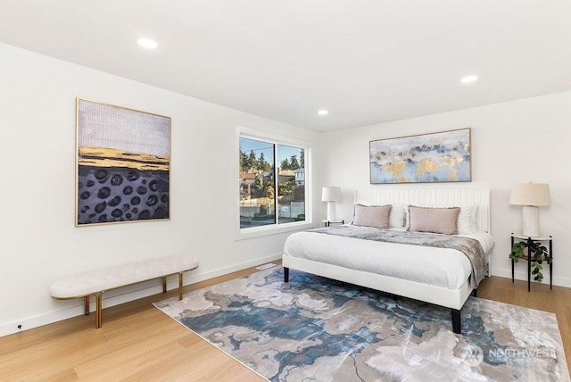 bedroom with wood-type flooring