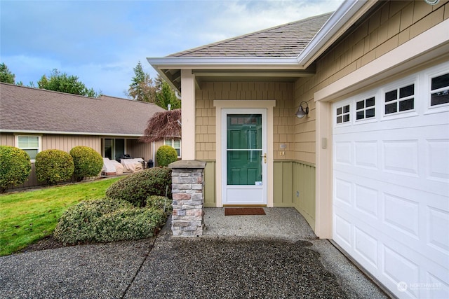 property entrance featuring a garage