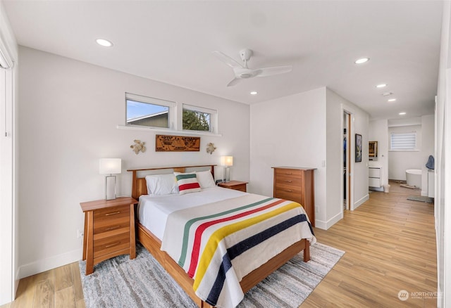 bedroom featuring ceiling fan and light hardwood / wood-style flooring